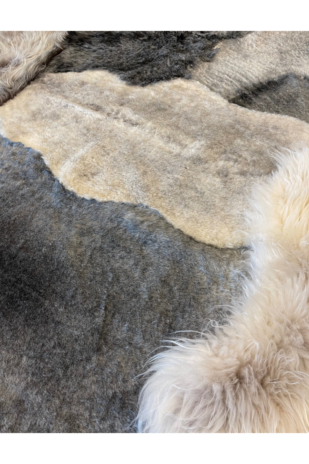 Patchwork sheepskins white gray
