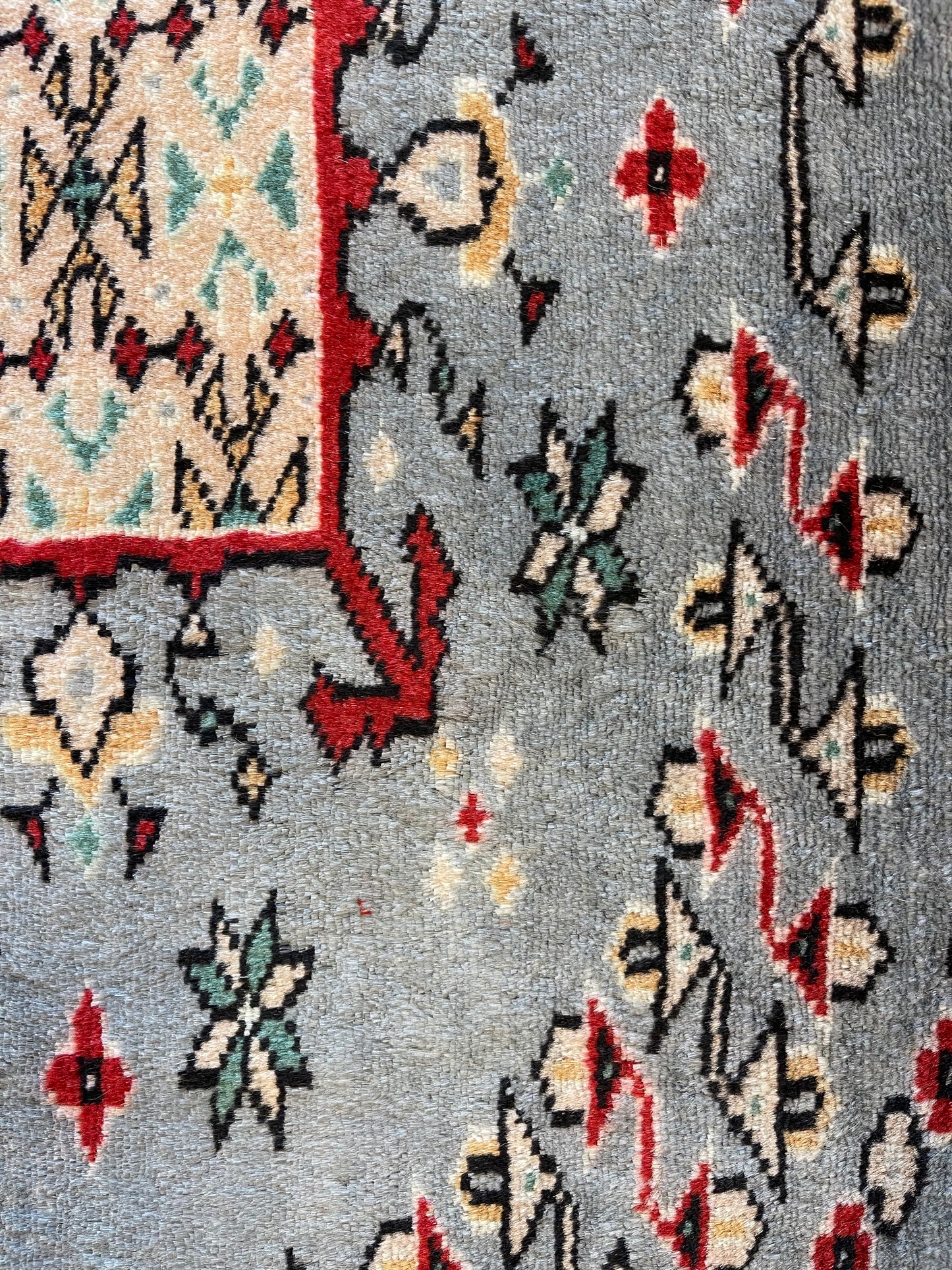 Hand-knotted Bokhara carpet