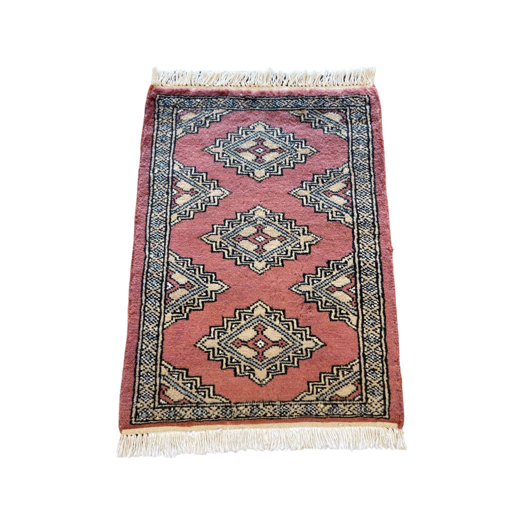 Hand-knotted Bokhara carpet