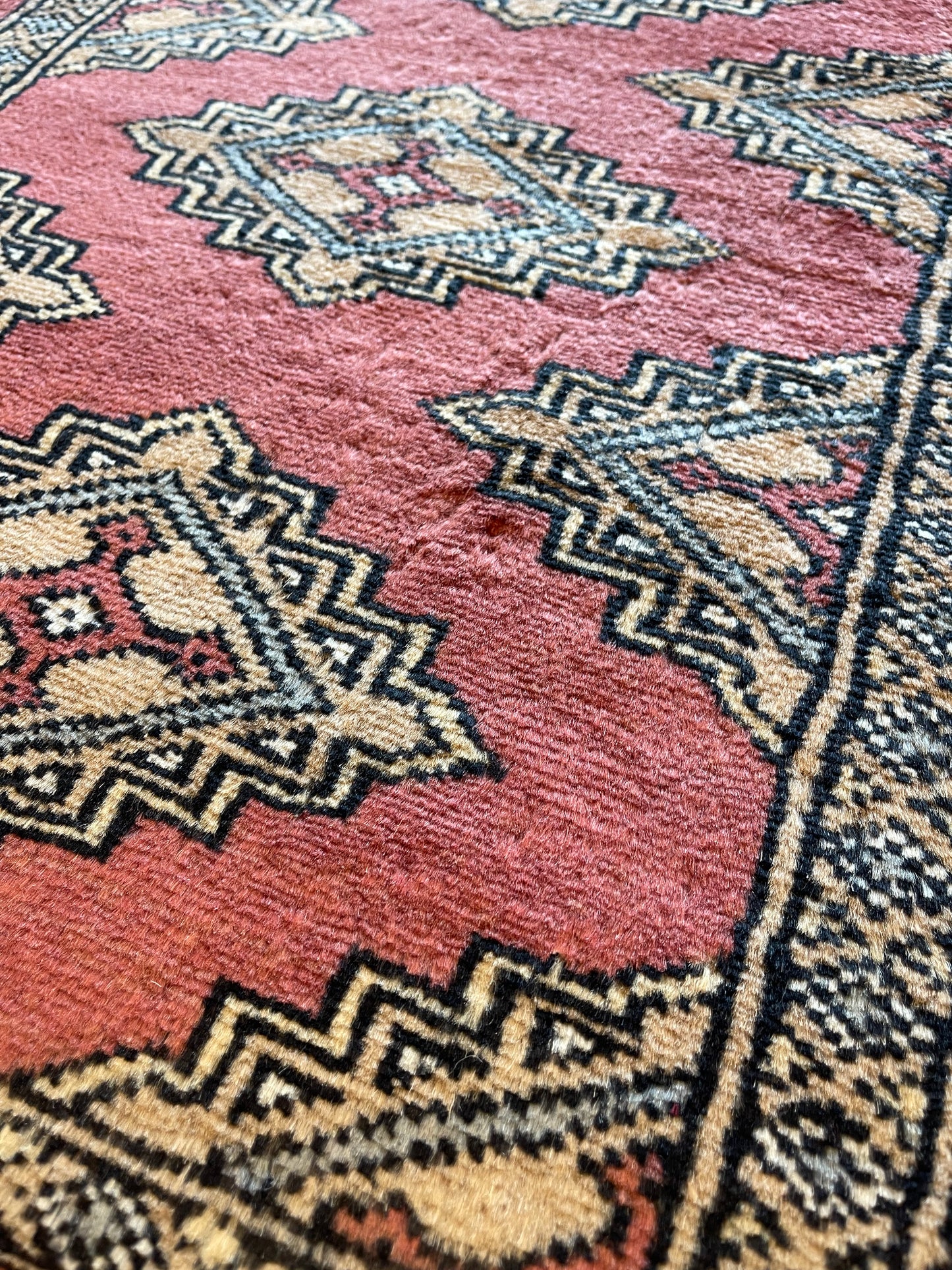 Hand-knotted Bokhara carpet